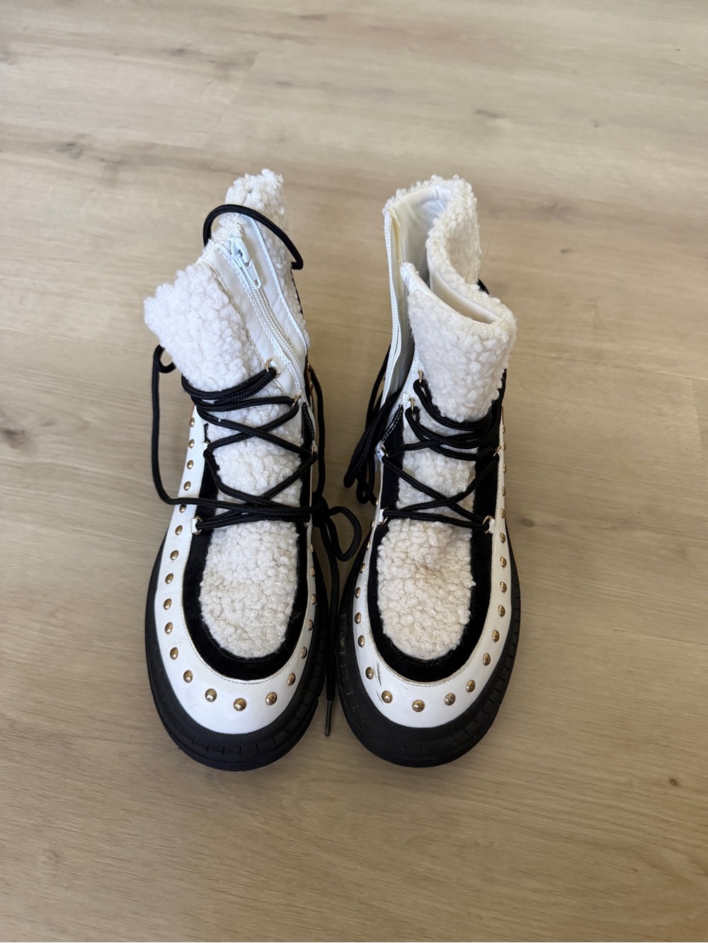JustFab White and Black Sherpa Combat Boots